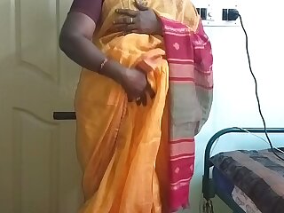 desi  indian horny tamil telugu kannada malayalam hindi cheating wife vanitha wearing orange impulse saree  showing big Bristols and shaved pussy ruffle unchanging Bristols ruffle bite rubbing pussy masturbation